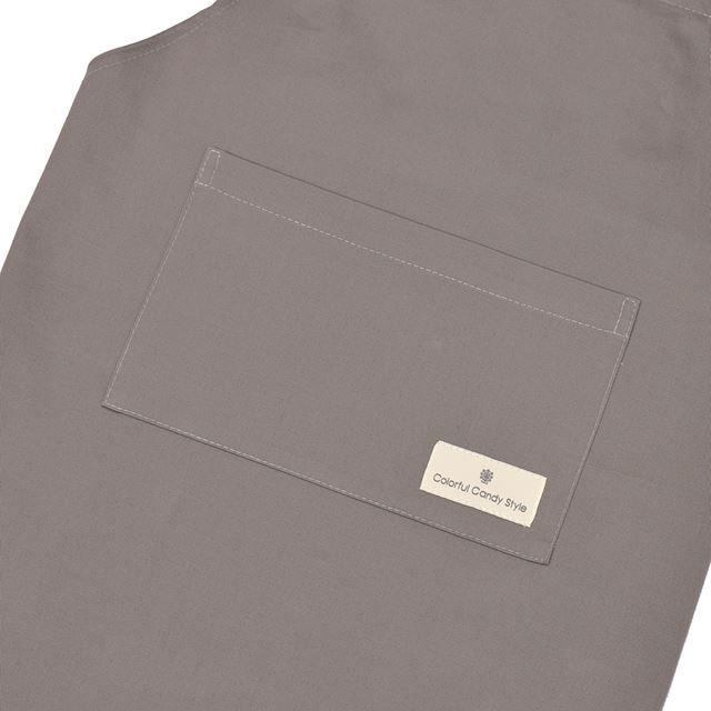 カラフルキャンディスタイルの三角巾付きキッズエプロン。子供用で、かぶるだけのバッククロスタイプ。男の子と女の子兼用で大活躍。