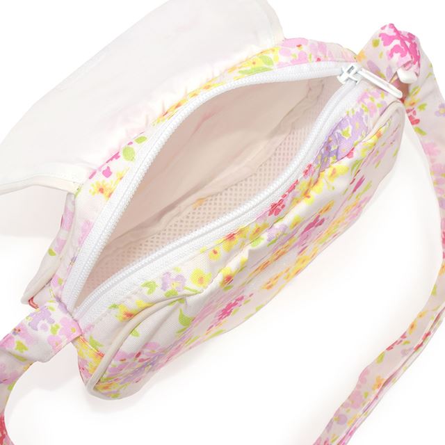 カラフルキャンディスタイルの持って可愛い丸型ポシェット。リボンのチャームがアクセント