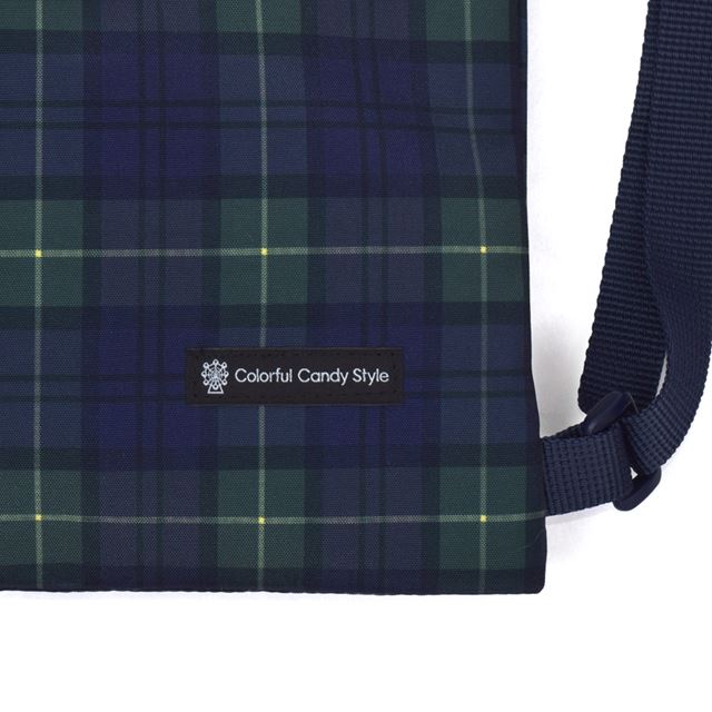 カラフルキャンディスタイルのナップサック。リュックにも手提げにも使える2WAY仕様。前面には便利なファスナー付きポケットを搭載。