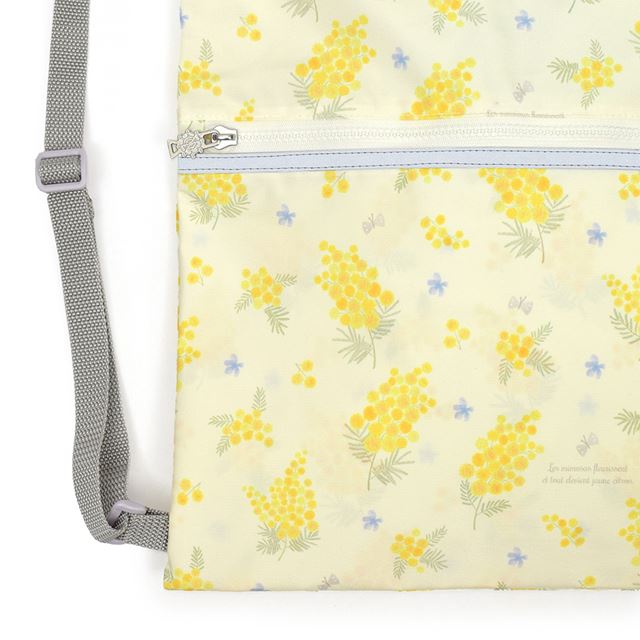 カラフルキャンディスタイルのナップサック。リュックにも手提げにも使える2WAY仕様。前面には便利なファスナー付きポケットを搭載。