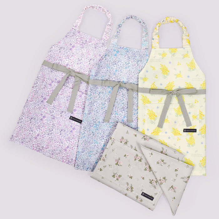 カラフルキャンディスタイルの三角巾付きキッズエプロン。子供用で、着脱簡単。男の子と女の子兼用で、家庭科の授業やお手伝いで大活躍。