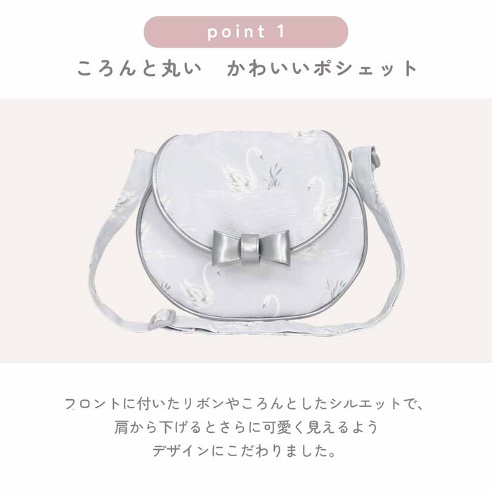 カラフルキャンディスタイルの持って可愛い丸型ポシェット。リボンのチャームがアクセント