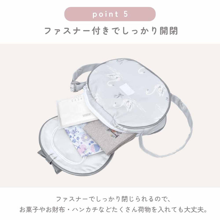 カラフルキャンディスタイルの持って可愛い丸型ポシェット。リボンのチャームがアクセント