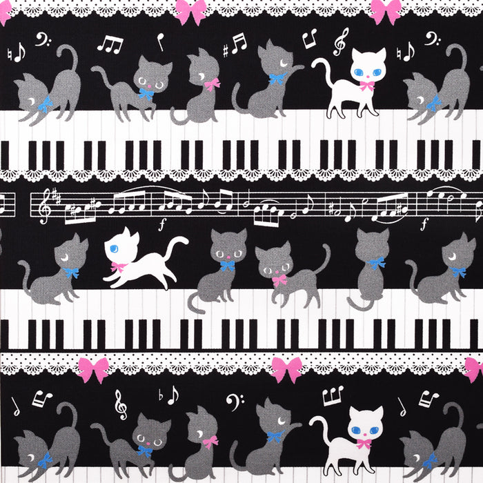 Black cat waltz dancing on a knapsack quilted piano (black) 