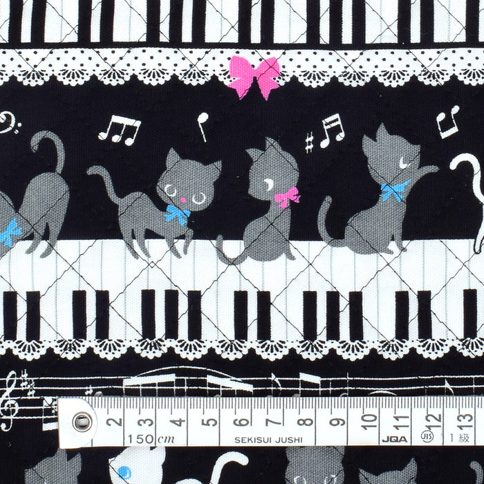 Black cat waltz dancing on the piano (black) quilting fabric 