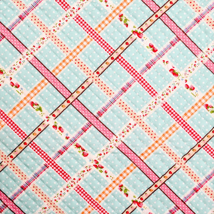 Wrapped in ribbon check (mint) quilting fabric 