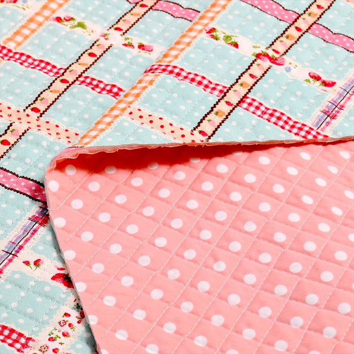 Wrapped in ribbon check (mint) quilting fabric 